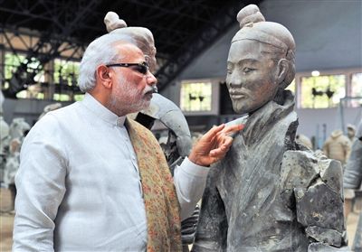 Mr. Modi is expressing great interest in terracotta warriors. 